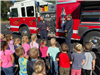 Walker Fire Dept. shows off fire engine for kids