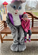 Easter Bunny with cute kid wearing pink