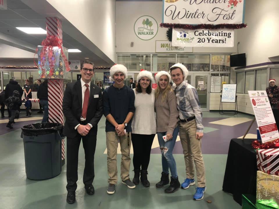 Attendees posing for a photo